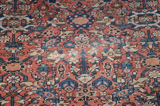 A Caucasian brick red ground carpet 280 x 273cm